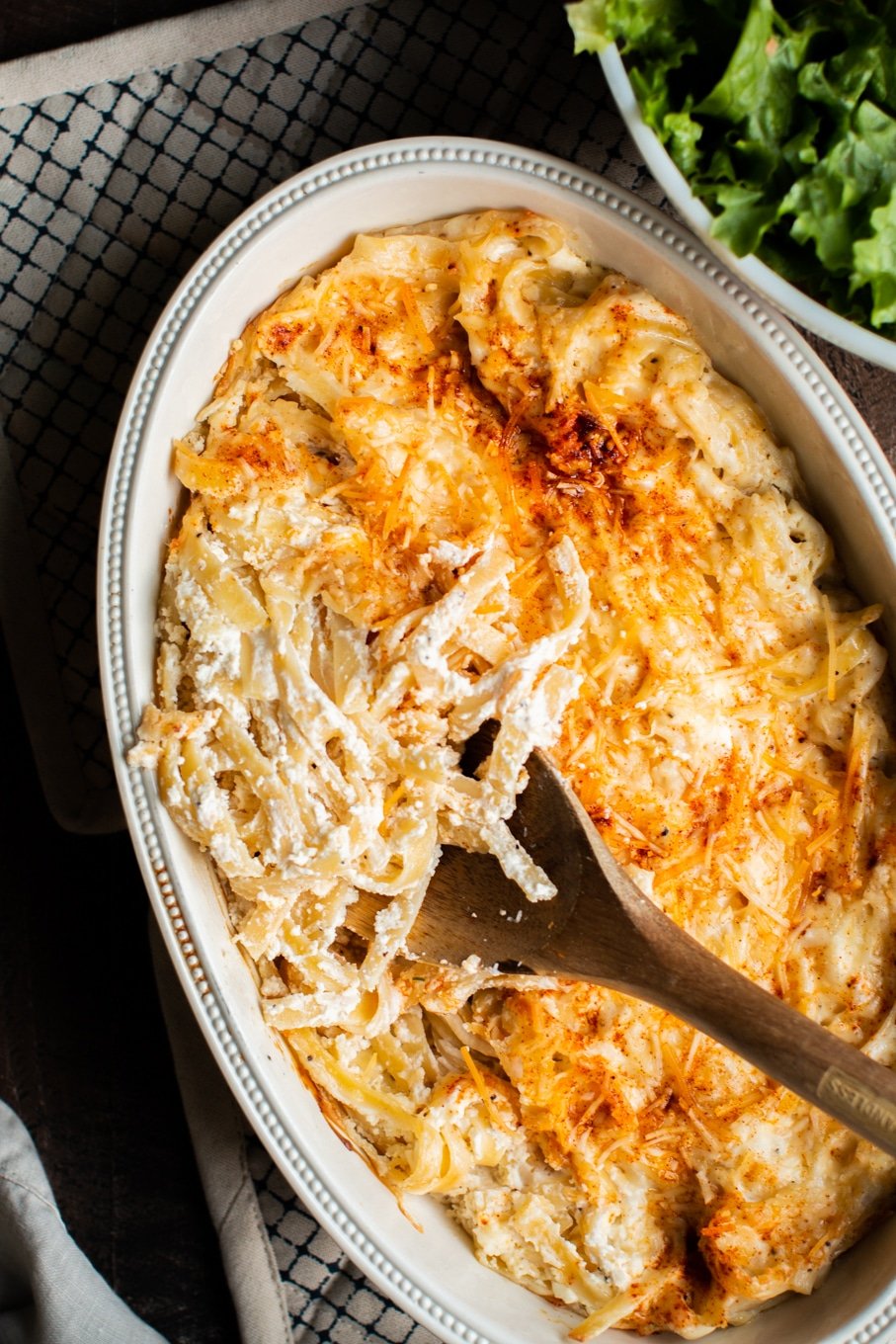 noodles romanoff in casserole dish with paprika on top.