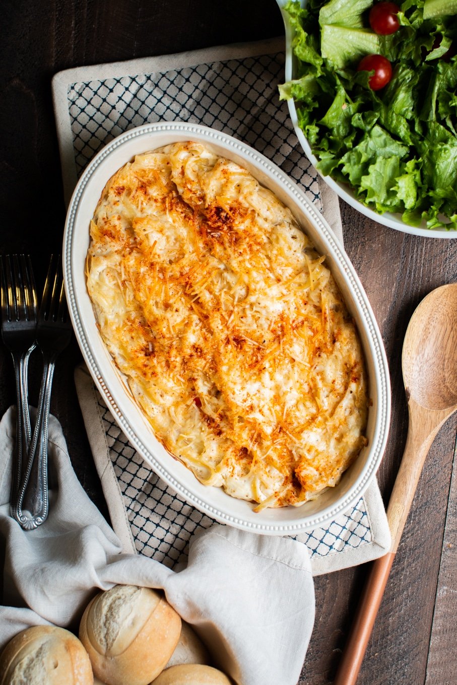 casserole dish with noodles romanoff in it.