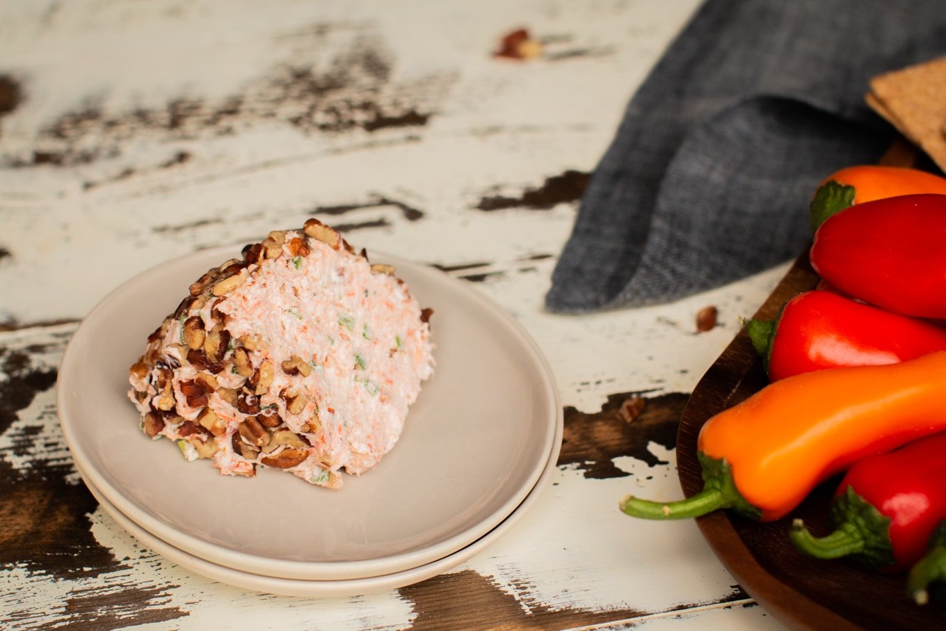 wedge of smoked salmon ball on plate