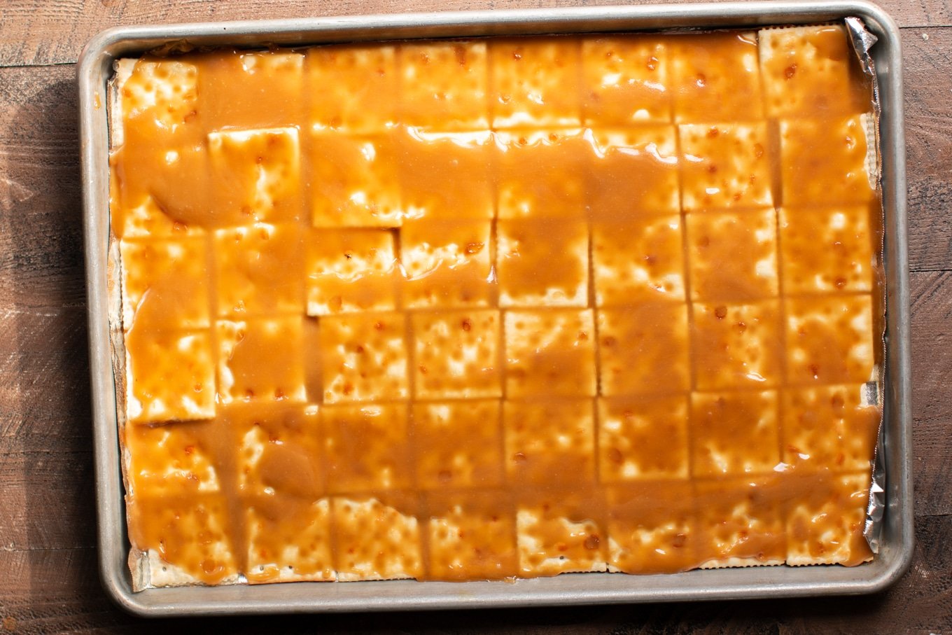 homemade caramel on saltine crackers