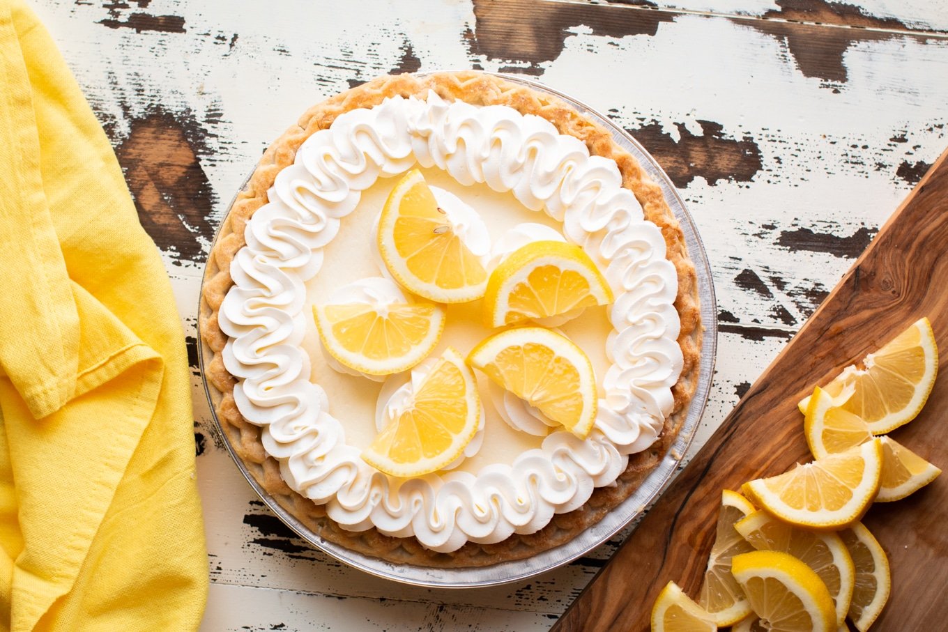 sour cream lemon pie on table