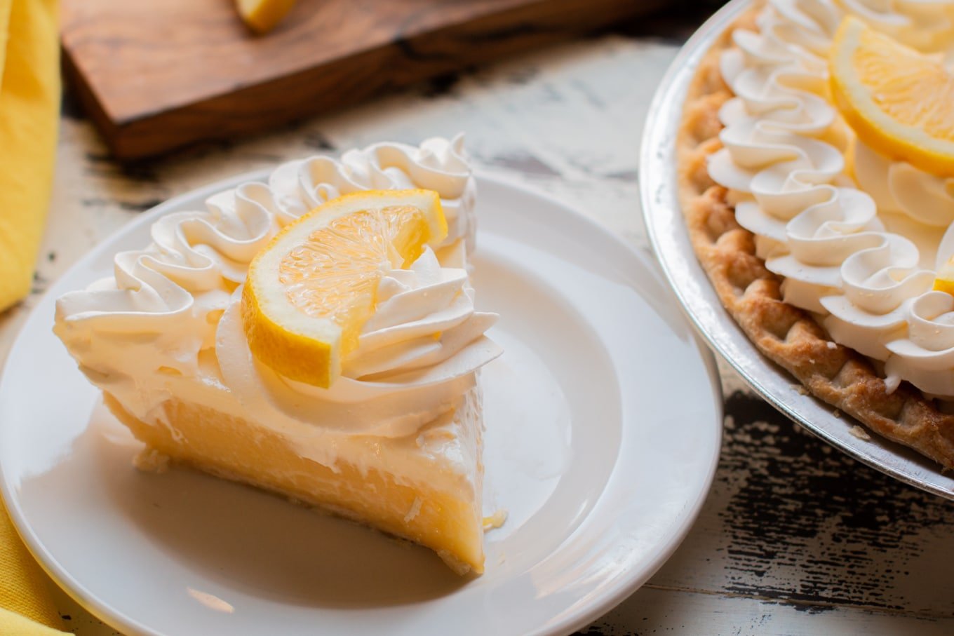 close up of slice of lemon pie