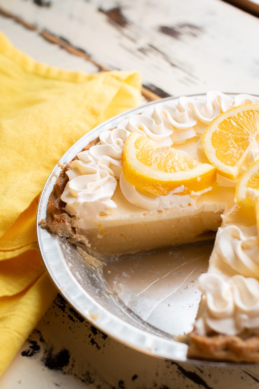 lemon pie with slice taken out