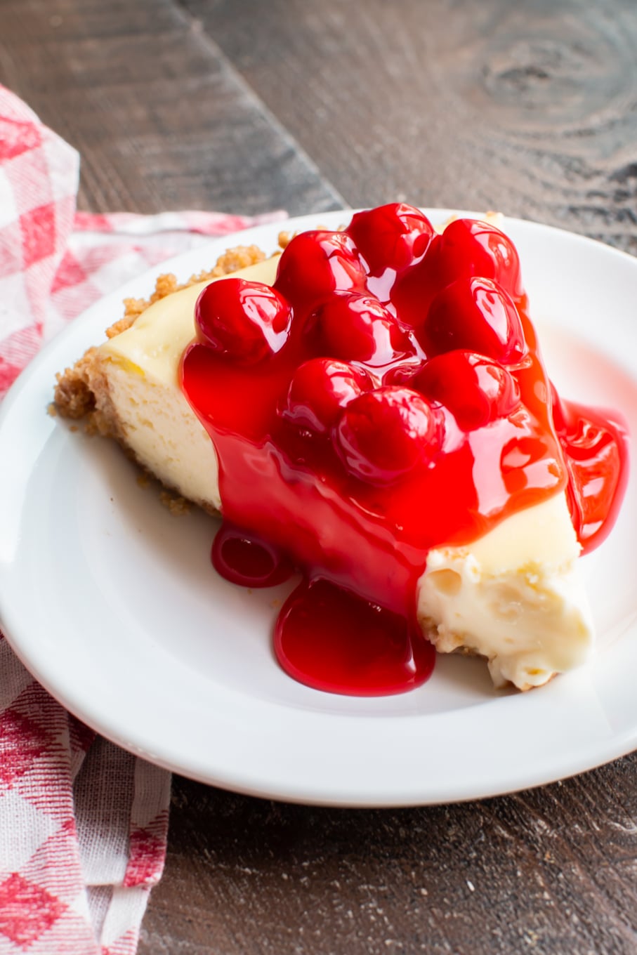 cherry cream cheese pie on white plate