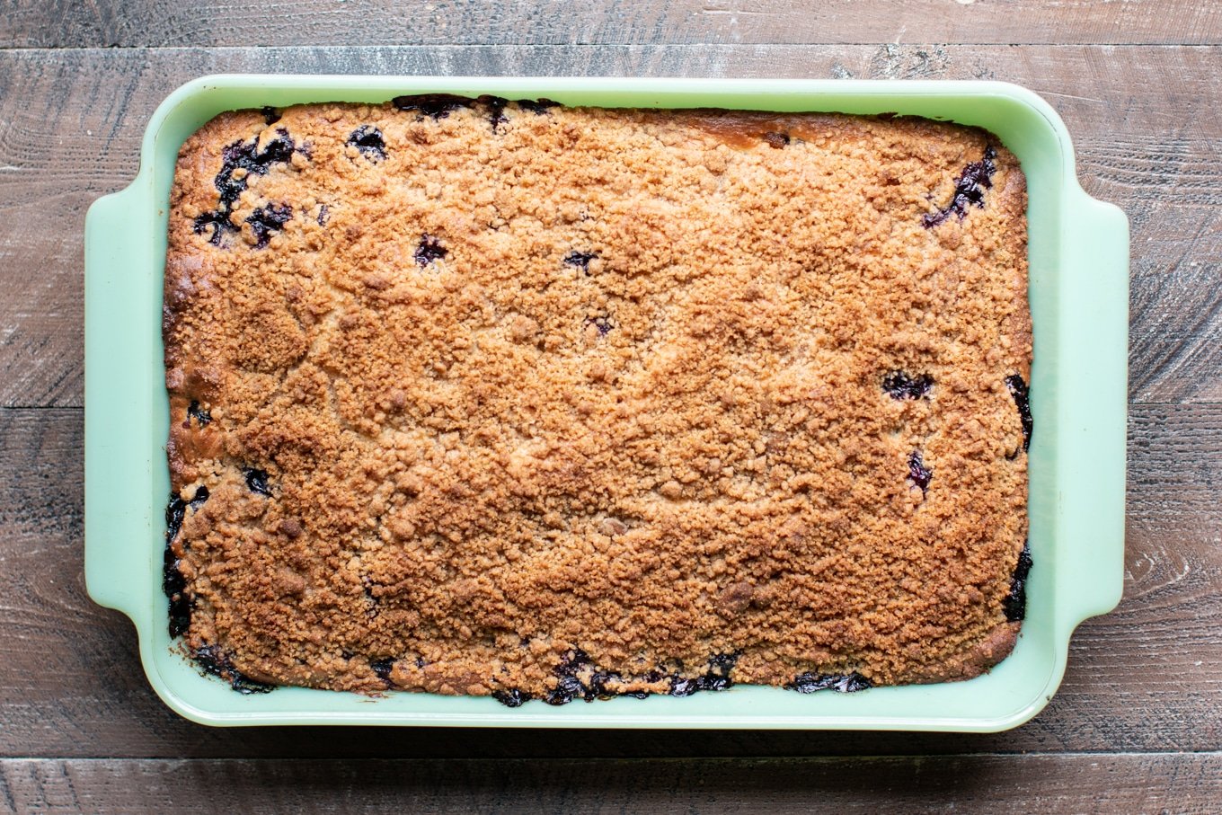 done cooking blueberry coffee cake in jadeite pan
