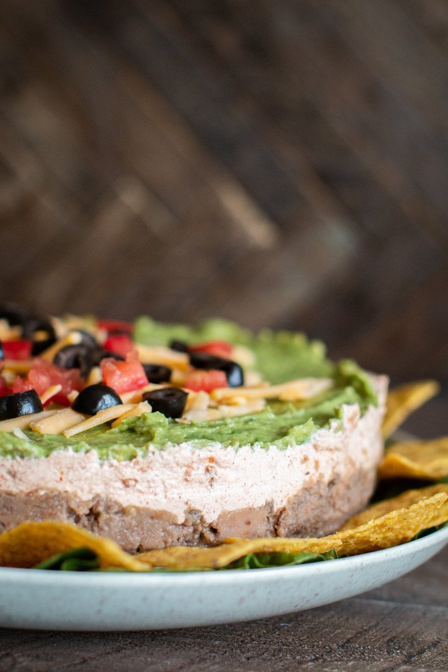 taco dip in layers on plate