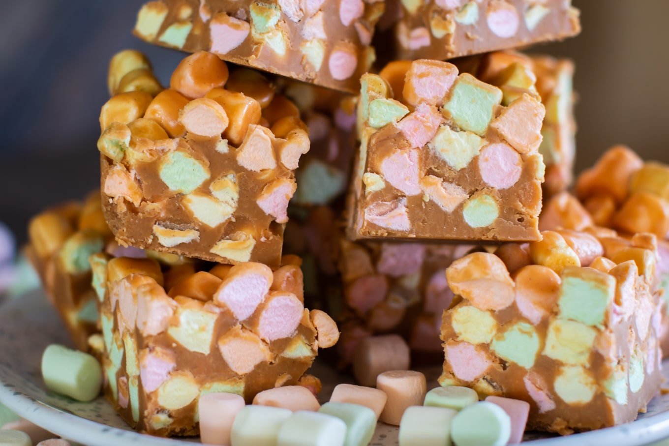close up of marshmallow squares on a plate