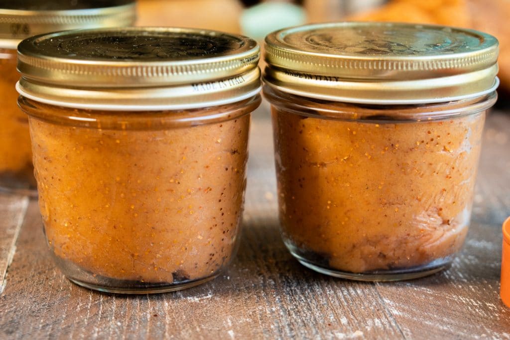 pumpkin dough in glass jars.