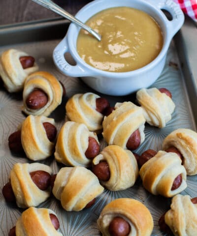 pigs in a blanket with mustard on the side