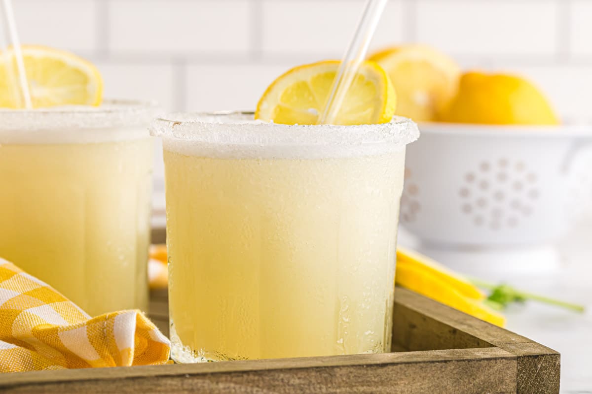 close up of frozen lemonade with straw in it.