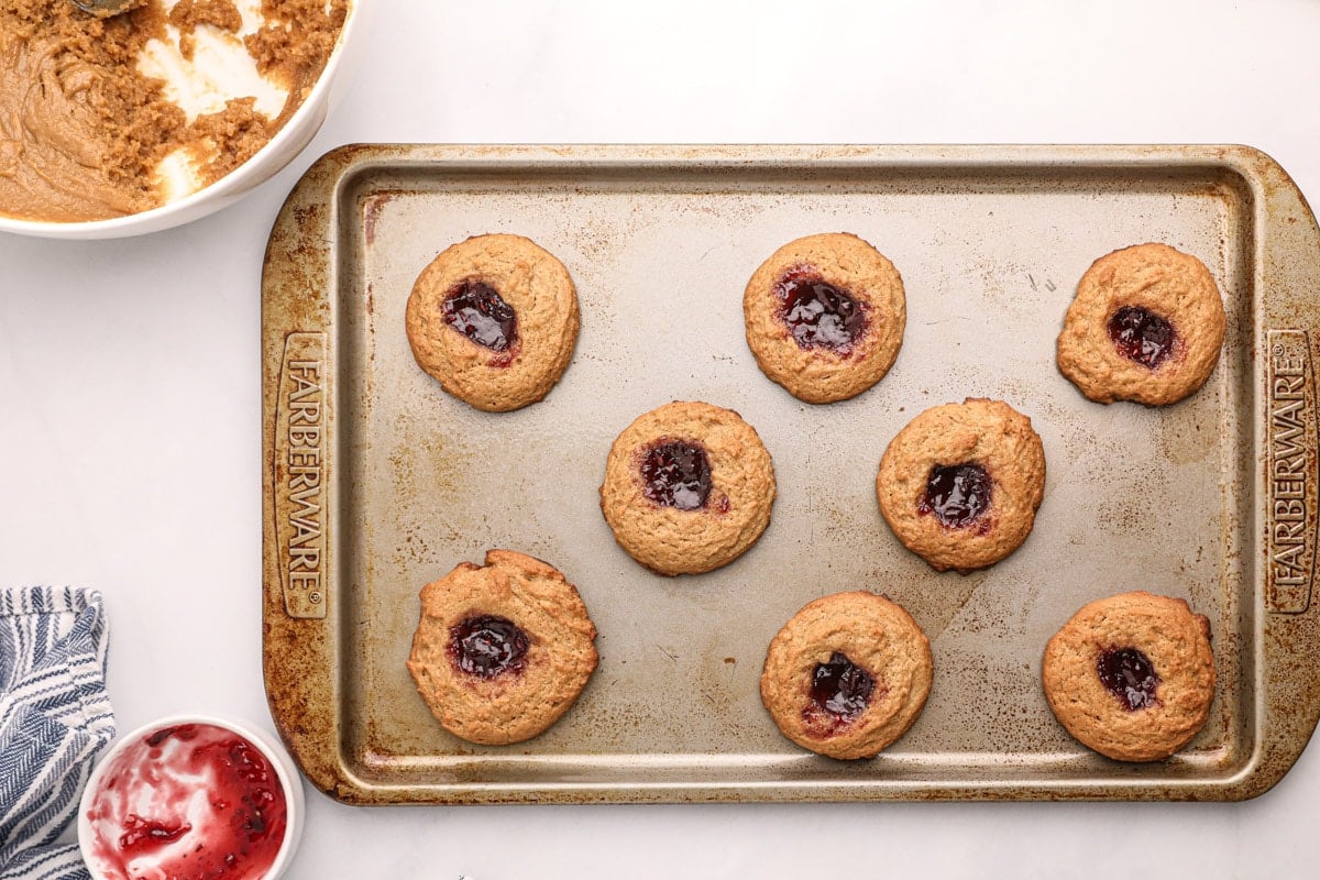 cooked pb and j cookies on sheet pan