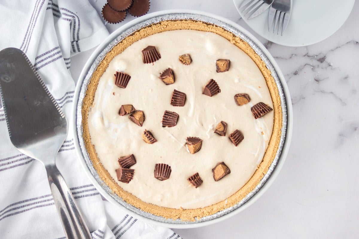whole peanut butter pie on a table
