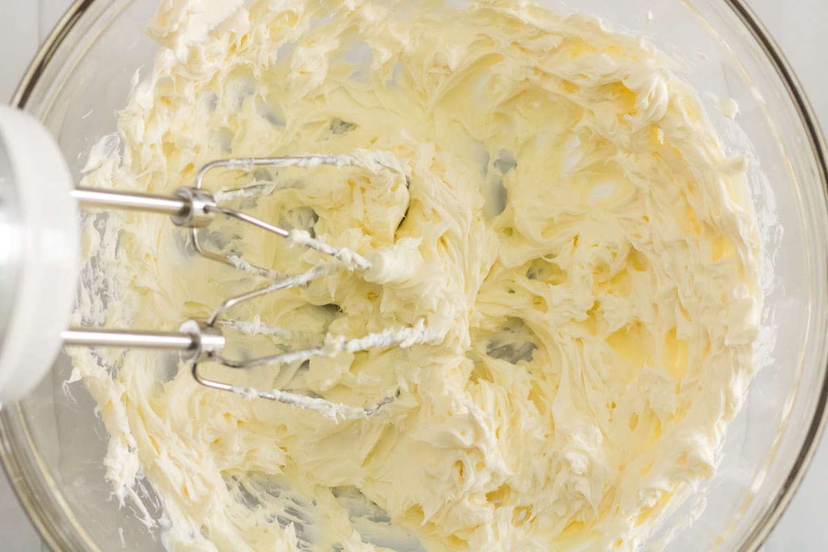cream cheese after being whipped with handheld mixer