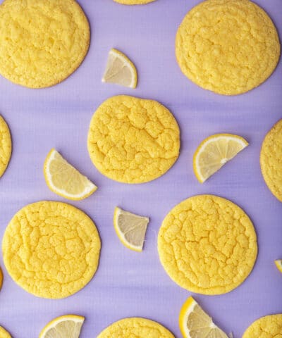 lemon cookies and lemon on purple table