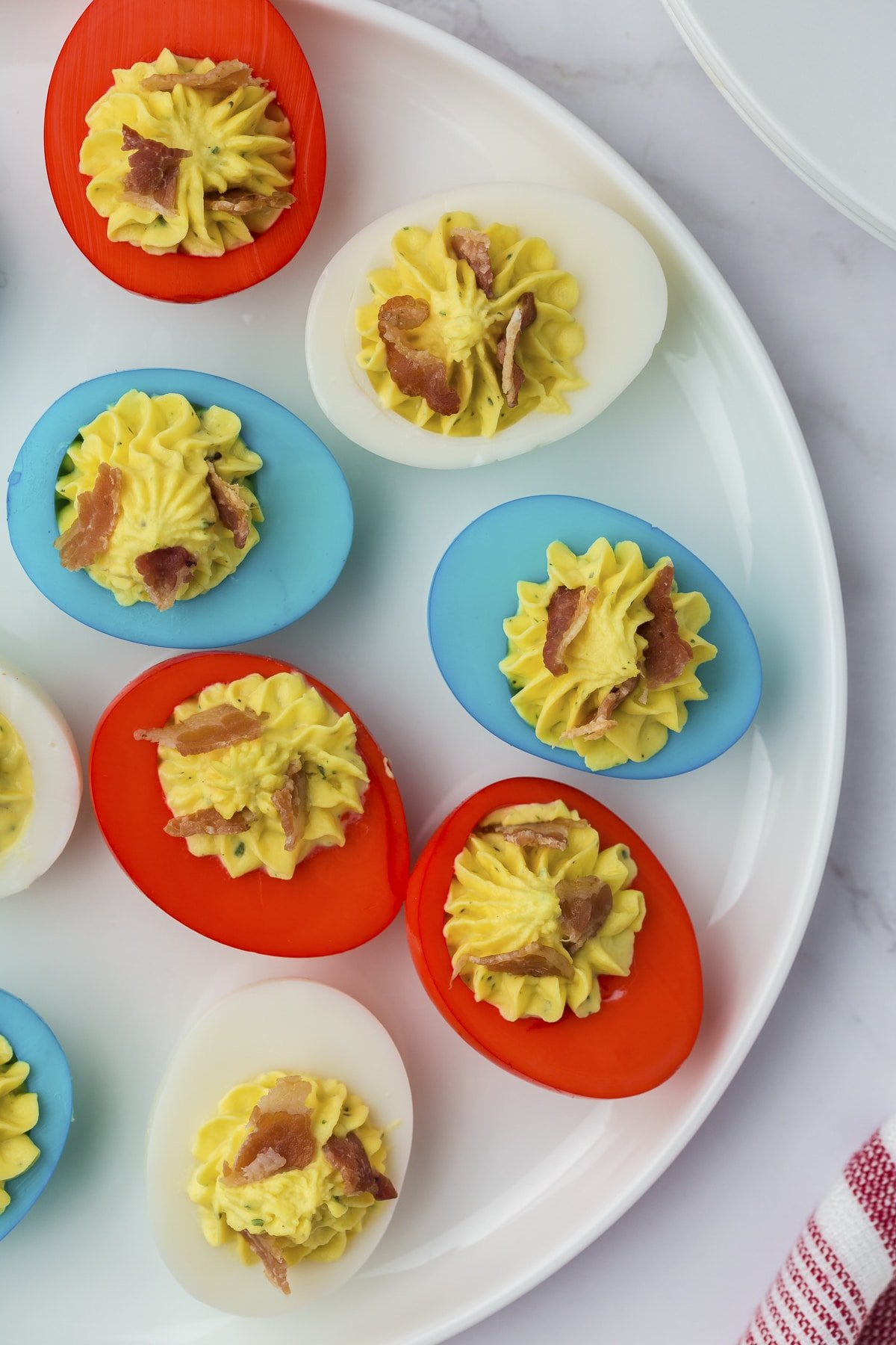 close up of dyed deviled eggs.