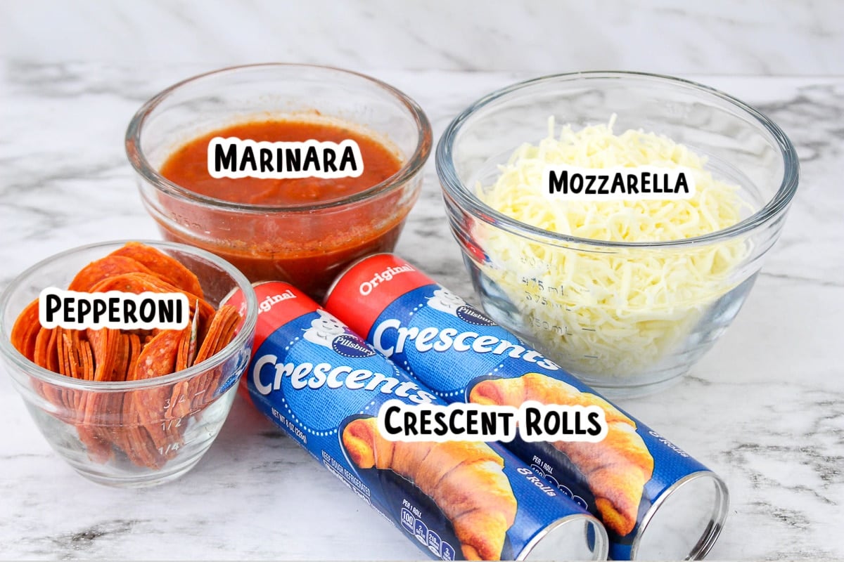 ingredients for pizza rolls on table.